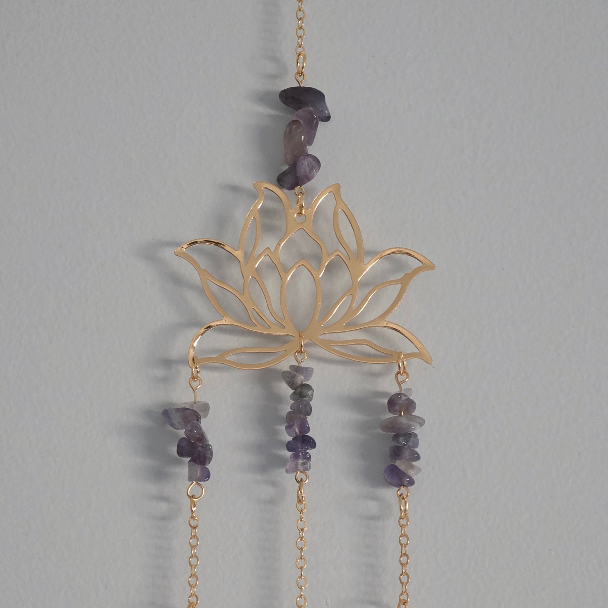 Suncatcher hanging with Gold Lotus and Amethyst crystal chip